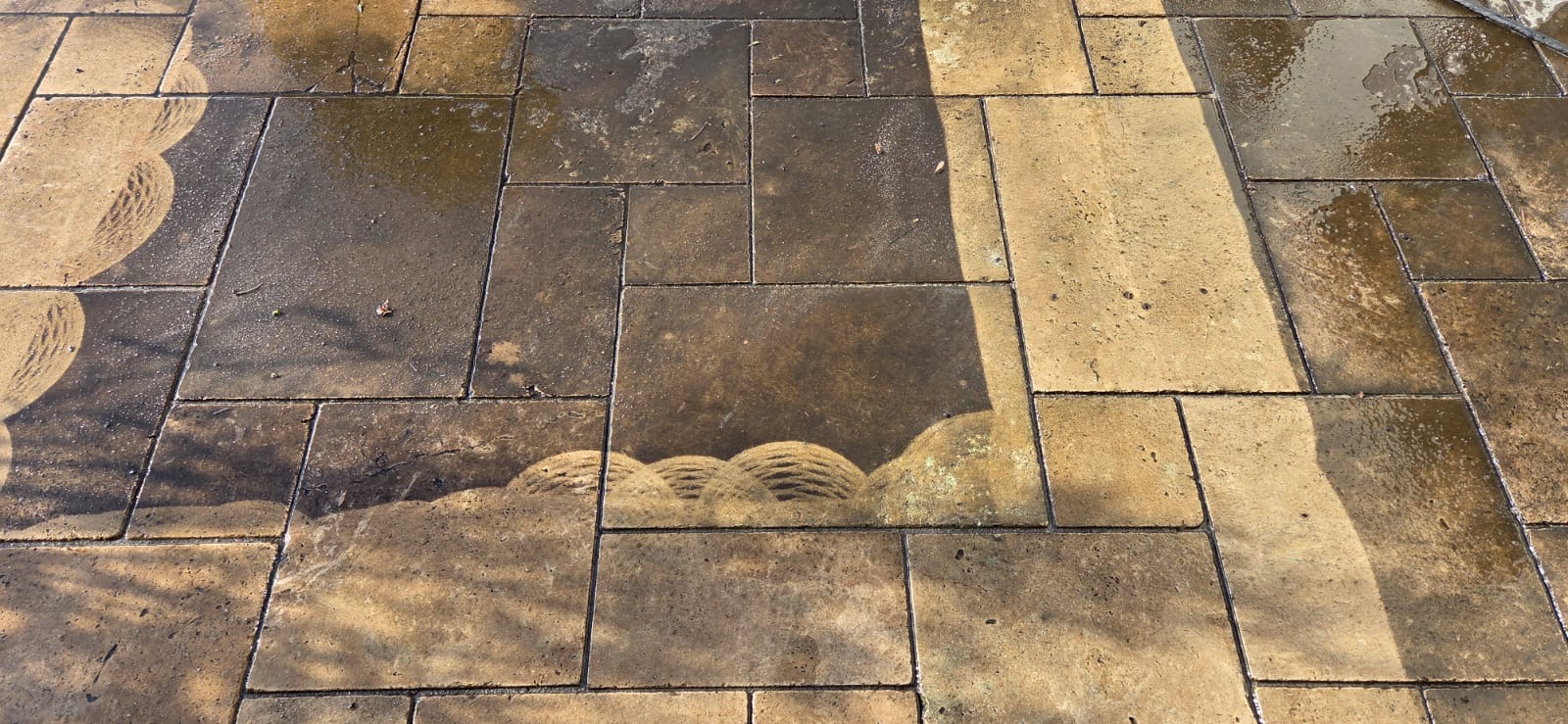 Pflasterreinigung Natursteinplatten